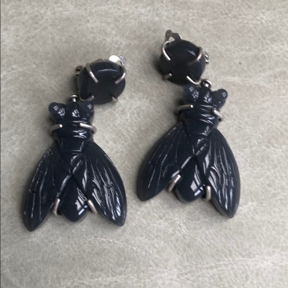Green fly clip on earrings